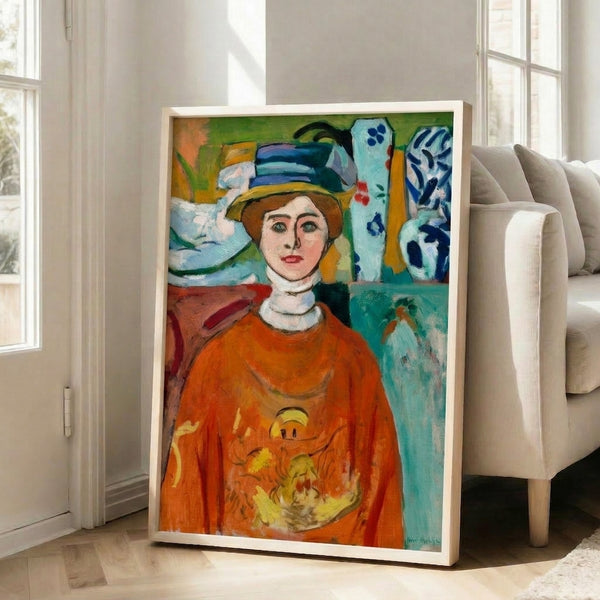 Portrait print featuring a young girl with commanding green eyes and warm facial tones, displayed as wall art with characteristic bold, expressive painting technique.