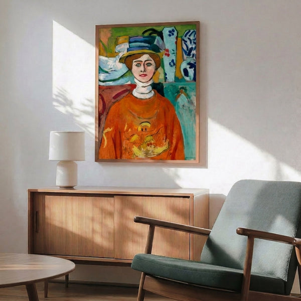 Framed wall art print of a girl with captivating green gaze against warm neutral background, created in bold expressionist style with simplified forms and rich color.