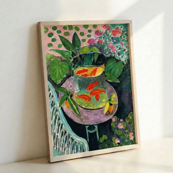 The Goldfish by Henri Matisse, an Art Nouveau-inspired framed print showing a red fish in a stylized aquatic scene with warm earth tones.