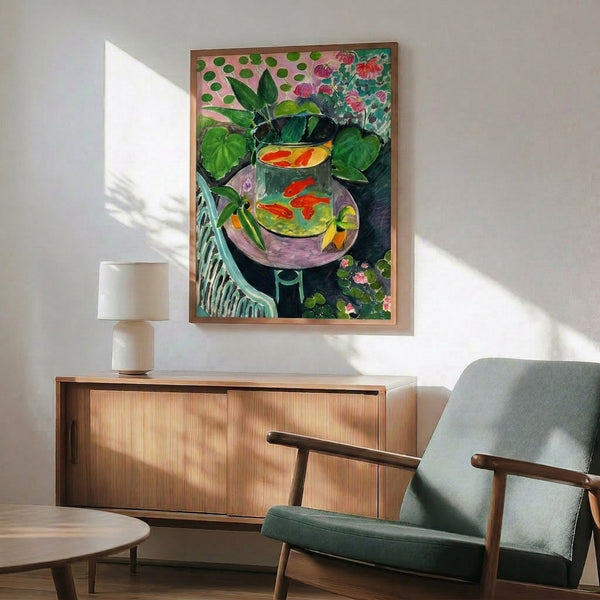 Framed contemporary art print of Matisse's Goldfish, featuring warm oranges, greens, and reds in a lyrical modernist composition.
