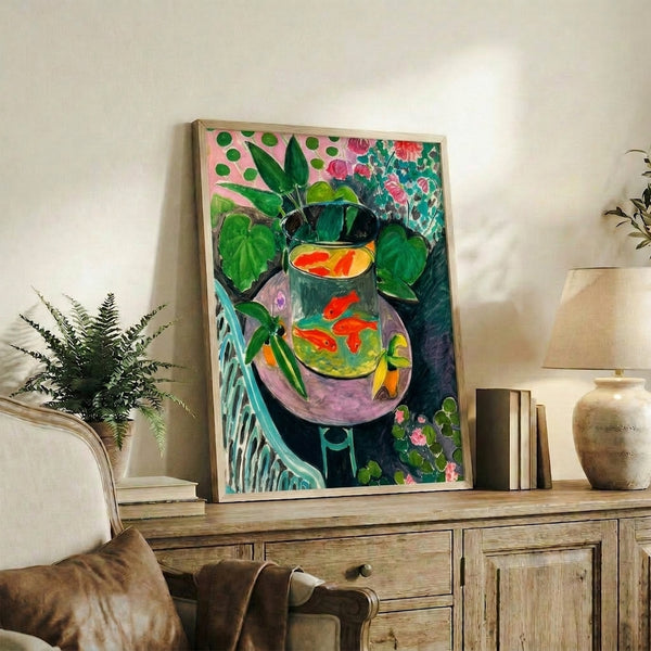 Poster art print presenting an elegant goldfish in its bowl surrounded by stylized foliage in warm coral and cool blue tones, creating a serene, reflective mood.