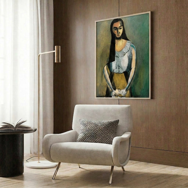 Modernist depiction of a figure with abstracted facial features in a subdued palette of warm and cool neutrals; matted poster art displayed on interior wall.