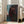 Wall-mounted art print capturing an intimate moment between two figures in expressive brushwork with muted, contemplative tones.