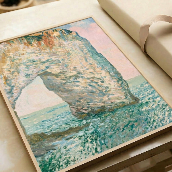 Tranquil maritime scene with the Manneporte rock formation silhouetted against soft sky and calm sea in impressionist style, framed on wall.