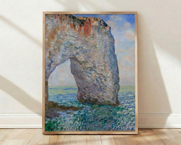 Impressionist seascape painting of a dramatic natural rock arch framing calm sea and beach, rendered in soft golden ochre, pale blue, and cream tones.