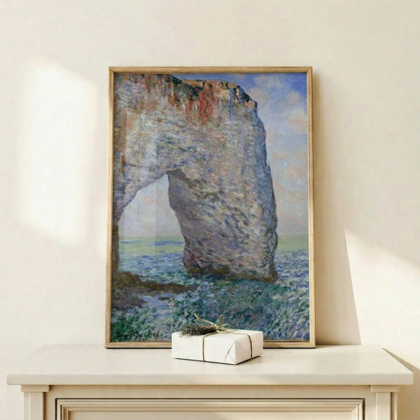 Monet's iconic beach scene depicting a dramatic stone arch carved into cliffs overlooking tranquil sea, framed poster in impressionist style.