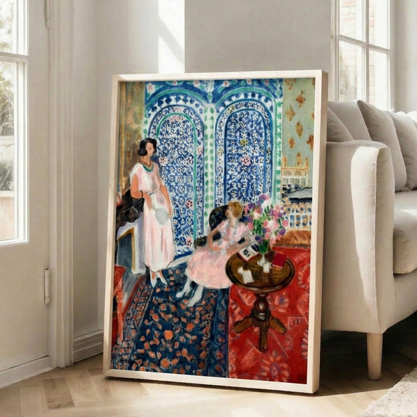 Wall-mounted poster with fluid, overlapping silhouettes in contrasting colors—mustard, teal, and coral—inspired by ornamental Islamic design.
