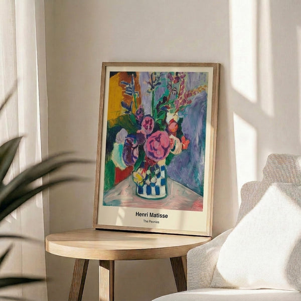 Modern abstract poster of pink and blue peonies with flowing green elements, expressive yet serene in style and mood.