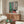 Contemporary framed art displaying a piano lesson moment with flattened forms and a meditative palette of warm and cool hues.