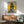 Framed art print with abstracted compositional elements in ochre, grey, and black tones, characteristic of post-war avant-garde painting.