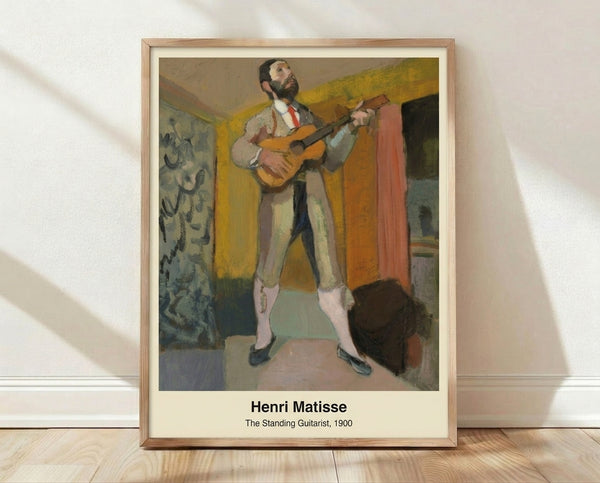 Line art portrait of a standing guitarist in ochre, blue, and black tones, rendered in a contemplative modern style; framed poster on wall.