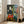 Matisse-inspired studio scene capturing artistic introspection through warm ochre walls, cool blue accents, and a view of Quai St Michel bridge, displayed as a modern wall print.