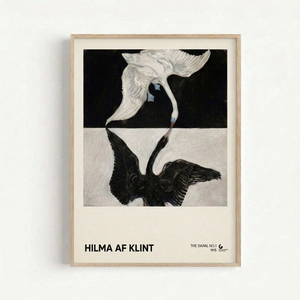 The Swan No.1 by Hilma af Klint displayed as a framed wall print, showcasing a serene bird silhouette in black and white with subtle blue tones in a vintage modernist composition.