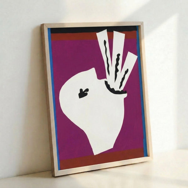 Colorful geometric cutout artwork depicting a sword swallower with dynamic shapes and a modern artistic sensibility, displayed as a framed print.
