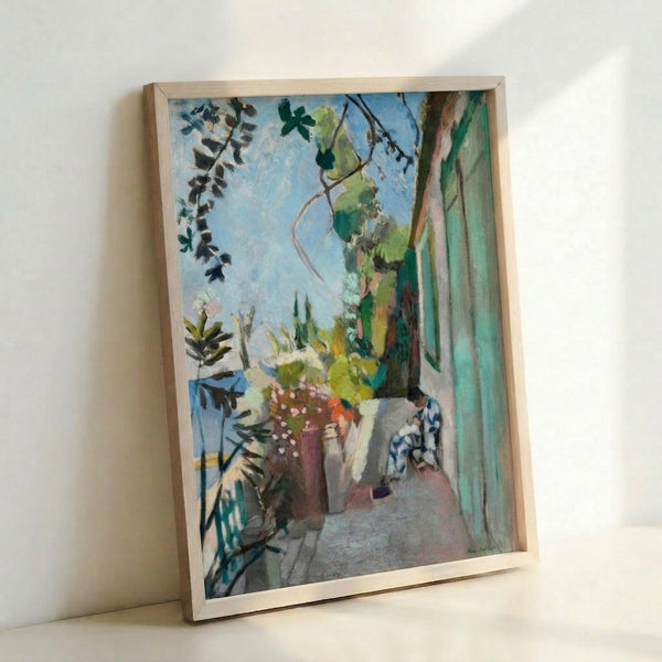 Colorful framed print of The Terrace St Tropez, Matisse's cubist-influenced landscape depicting a breezy seaside composition with rich jewel tones and dynamic brushwork.