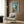 Framed Matisse poster: The Terrace St Tropez, an uplifting landscape artwork with flattened perspective and radiant palette of blues, greens, and warm accents.