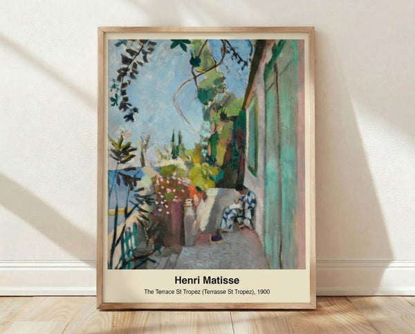 Matisse's Terrace St Tropez framed poster featuring a vibrant Mediterranean harbor scene with cobalt blue waters, warm yellow sunlight, and terracotta buildings in Impressionist style.