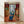 Matisse framed poster featuring a serene interior scene with warm ochre and soft blue tones, depicting a figure by a Mediterranean window during afternoon light.