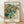 Abstract Impressionist landscape painting of Gardanne village with geometric roofs and hillside forms in ochre, olive green, and slate blue tones, framed on wall.