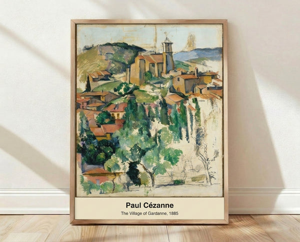 Abstract Impressionist landscape painting of Gardanne village with geometric roofs and hillside forms in ochre, olive green, and slate blue tones, framed on wall.