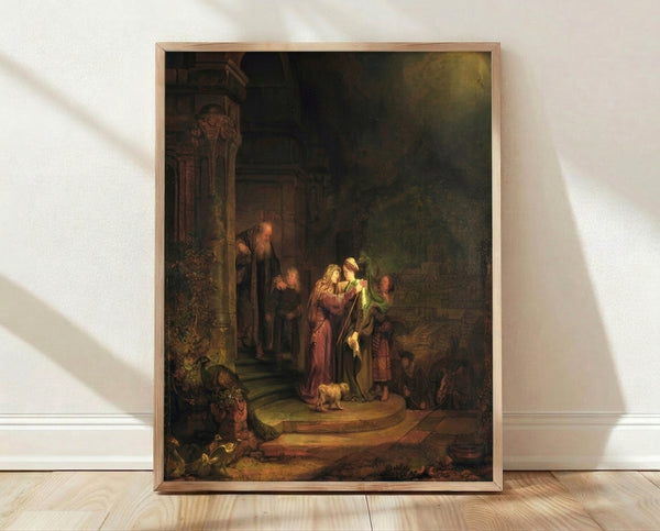 Rembrandt's The Visitation from 1640, a biblical narrative painting featuring warm golden tones and dramatic chiaroscuro lighting, framed as a poster on a wall.