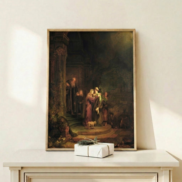 The Visitation by Rembrandt van Rijn, a contemplative biblical scene with soft golden lighting and muted earth tones, displayed as a framed print.