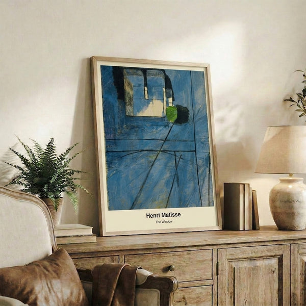 Modern minimalist wall art depicting light through a window in soft blue and gray tones, evoking tranquility and reflection.