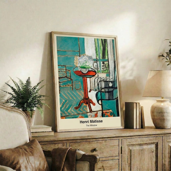 Modern art print of a simplified interior with turquoise window, ochre table, and black chair creating a peaceful, balanced composition.
