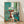 Abstract modernist framed poster featuring geometric window composition in vibrant blues, greens, and warm tones with minimalist design sensibility.