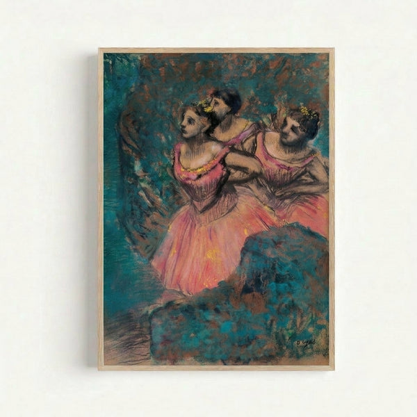 Wall-mounted art print depicting three graceful ballet dancers dressed in rich red garments, painted in loose impressionistic style with muted golden and cream background tones.