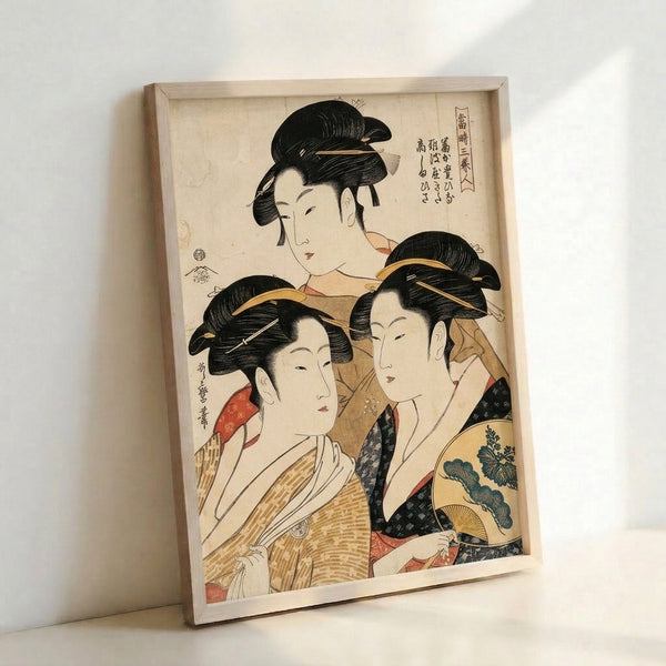 Three graceful geishas in elaborate traditional dress featured in this refined Japanese woodblock-inspired poster art, showcasing intricate kimono patterns in cream, red, gold, and black.