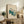 Japandi-style framed art print featuring three barn owls rendered in simple line work with cream, teal, and earthy brown hues, evoking understated tranquility.