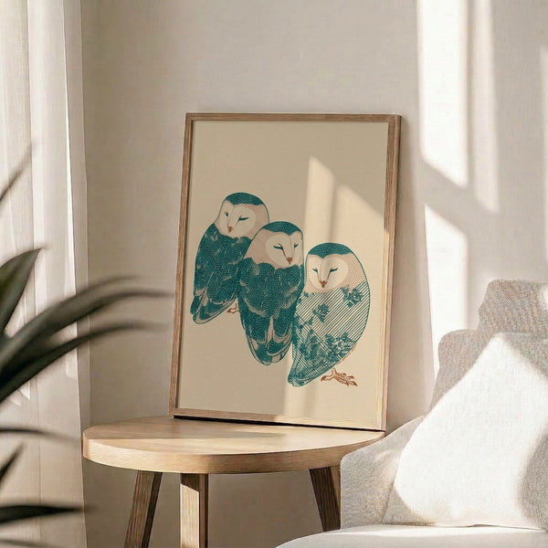 Three barn owls depicted in flowing line art with a muted cream and warm brown palette accented by teal, creating a serene and minimalist wall display.