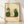 Folk art poster featuring three whimsical sheep in cream and tan tones surrounded by sage green and olive botanical elements, evoking a peaceful cottagecore aesthetic.