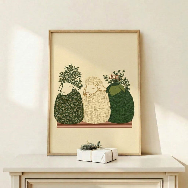 Boho-style framed art print depicting three charming sheep amid flowering herbs and plants in soft earth tones of cream, terracotta, and sage green.