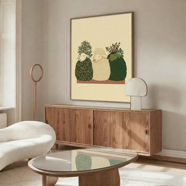Cozy folk art print showing three sheep characters nestled among delicate flowers and foliage in warm cream and soft green hues with a whimsical, peaceful mood.