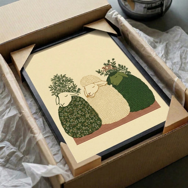 Cottagecore wall art featuring three quirky sheep surrounded by botanical motifs in a gentle palette of cream, olive green, and terracotta on a framed poster.
