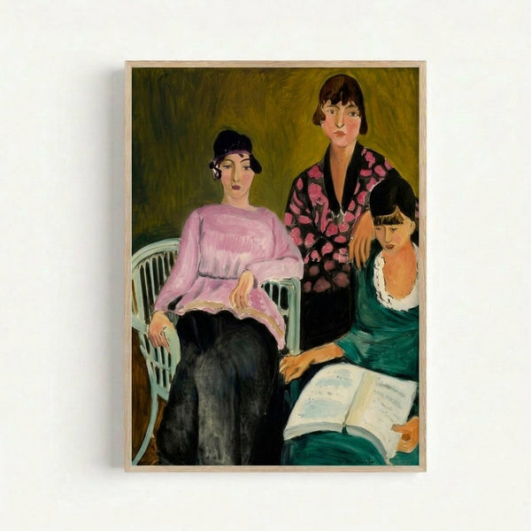 Three Sisters art print featuring stylized female portraits in vibrant earth tones, displayed as framed wall art in a contemporary style.