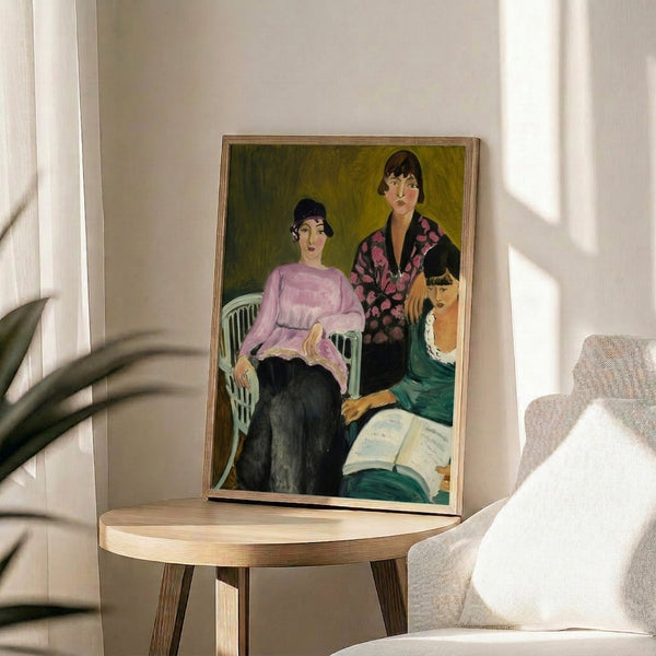 Wall art print featuring three stylized female portraits in warm, harmonious tones of ochre and cream with a modern expressionist aesthetic.