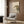 Japanese woodblock-inspired wall art of a tiger gazing at a crescent moon in minimalist composition with warm earthy tones.