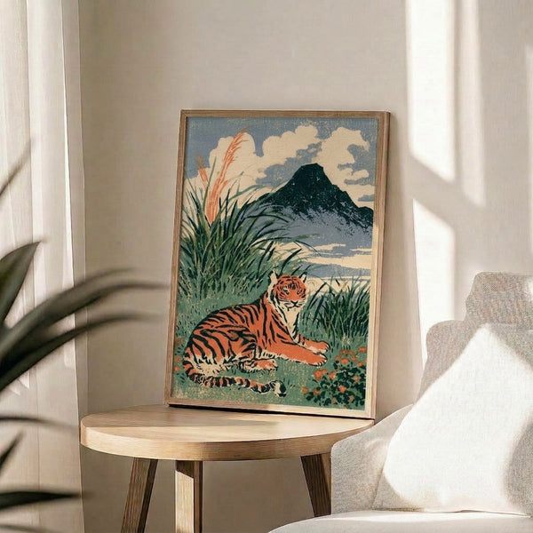 Framed wall art depicting a noble tiger in a mountainous setting with delicate flowers and clouds, rendered in the traditional Japanese woodblock style with rich slate and cream hues.