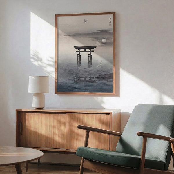 Tranquil black and white art print with a torii gate as focal point, moon glowing overhead and its reflection dancing on dark water below.