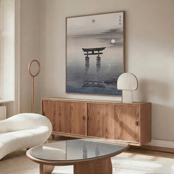 Minimalist poster showing a moonlit Japanese gateway framed by water landscape, rendered in subtle grays and creams in the style of traditional woodblock prints.