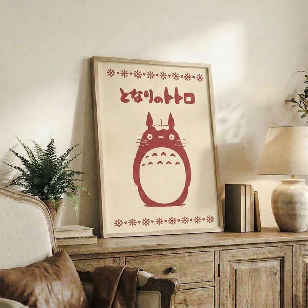 Framed minimalist wall art depicting a cherished spirit character in burgundy and off-white tones, combining Japanese anime charm with contemporary design sensibility.
