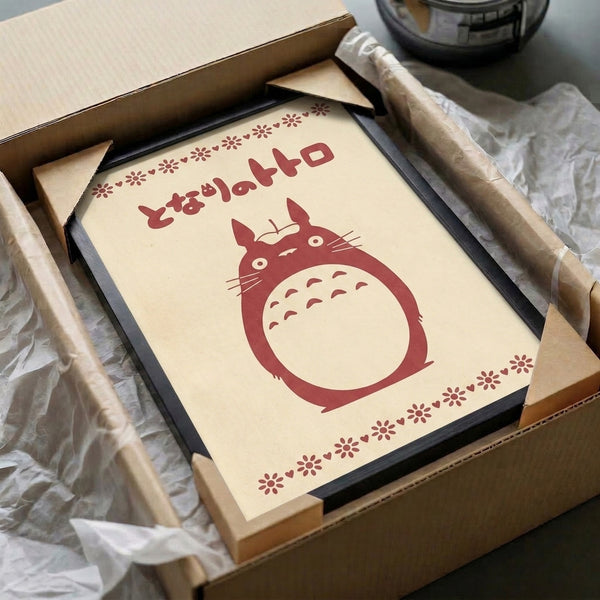 Minimalist Japandi-style framed poster of an endearing creature spirit in warm burgundy and cream, incorporating Japanese calligraphy in a gentle, contemporary composition.