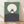 Minimalist framed poster featuring a silhouetted Totoro sitting on a grassy hill beneath a glowing moon, rendered in sage green, dark gray, and cream tones with a peaceful, whimsical mood.