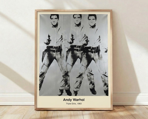 Bold pop art framed poster featuring three repetitions of Elvis Presley in vibrant gold, cyan, and magenta tones against black, capturing the iconic musician's likeness in classic Warhol style.