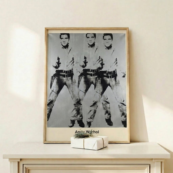 Contemporary pop art wall print depicting Elvis Presley repeated three times in luminous gold, magenta, and cyan against a dark backdrop.