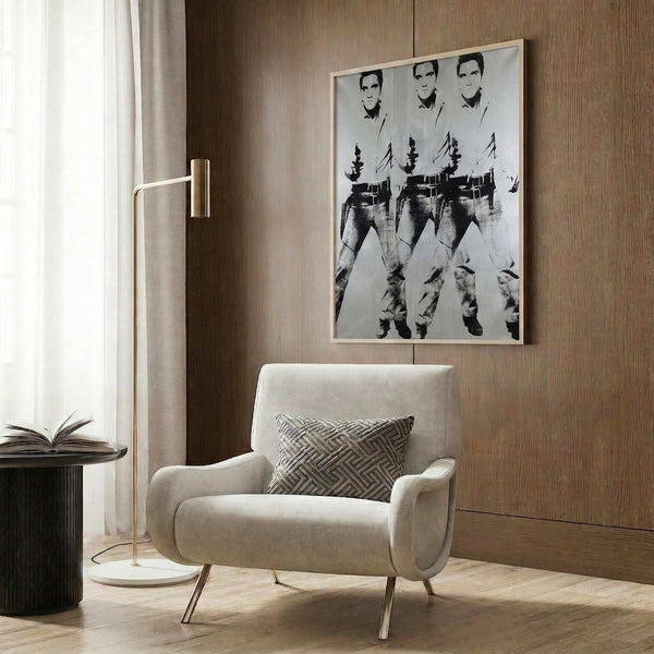 Framed Warhol-inspired pop art poster with three replicas of the King in cowboy wear, capturing the dynamic energy and graphic boldness of mid-century American pop art.
