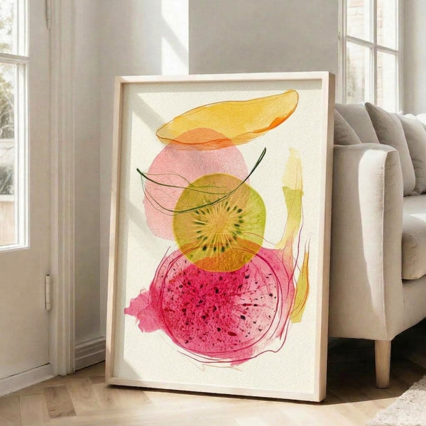 Framed watercolor study of tropical fruits including kiwi, dragon fruit, and banana with delicate linework in yellow, pink, coral, and green tones.
